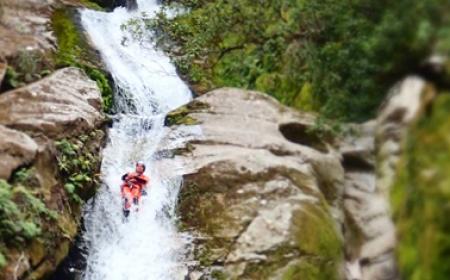 Abel Tasman Canyons Waterfall slide by Lee den Haan